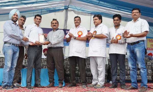 Dr. H. K. Verma, Director of Extension Education awarded the 2nd prize for stall exhibition to School of Animal Biotechnology in Pashu Palan Mela